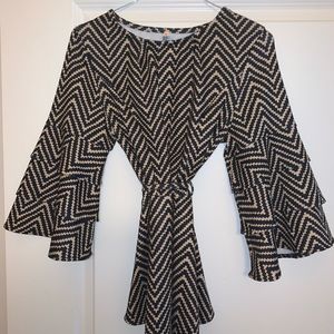 COPORATE ANIMAL PRINT PERPULUM BLOUSE